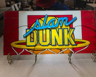 These are the glass fronts to slot machine machines. We have 12 of them in the auction. They will be sold individual. They would look great in a man cave or in a bar.