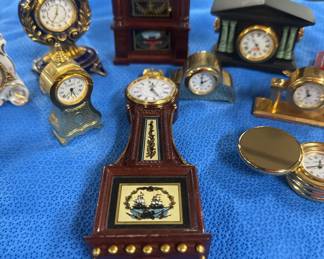 Collection of miniature clocks from the Franklin mint