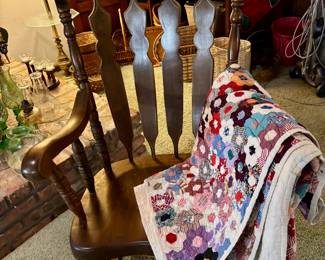 Wooden rocker with handmade quilt 
