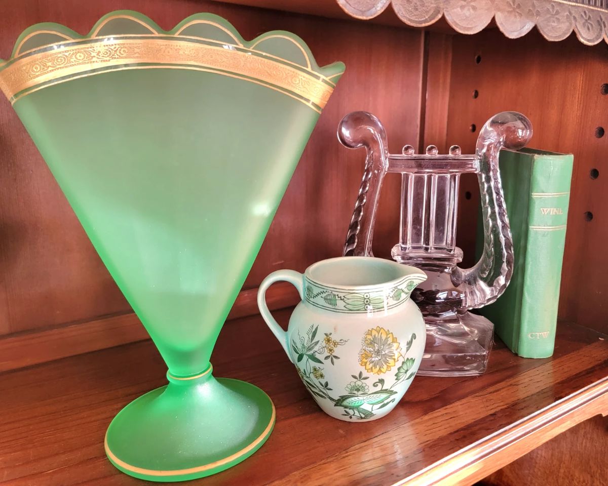 What a beautiful shade of green! There are two of these vases.