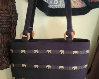 There are many purses and bags, but I just love the elephants on this one :)