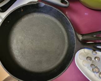 Several cast iron pans available