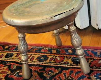 The cutest little brass stool.