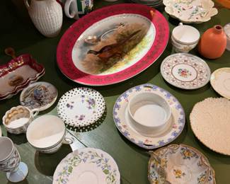 Small china sets and individual pieces thoughtfully collected during global travels 