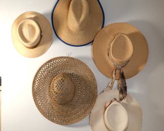 Collection of straw hats 