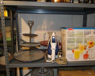 Because a three tired stand, and an iron, along with a smooth maker, all happy to share the same shelf space