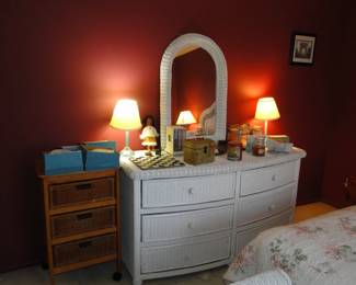 That wicker dresser and mirror, offer plenty of good looks, and lots and lots of storage space