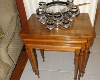 That Mid Century Modern punch bowl set, looks mighty good on those three nesting tables