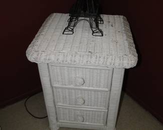 Small wicker three drawer nightstand, or could be used as a side table
