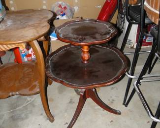 Round two tiered table, and yes it would have been to much to dust it, but when you come out, it will be all neat and clean. Garage's are cold