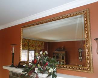 Huge, ornate mirror with wonderful frame. Mirror is beveled too