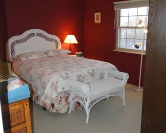 We have this wonderful bedroom set, all done up in wicker