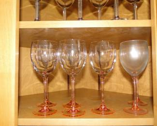 These are pink stemmed wine glasses