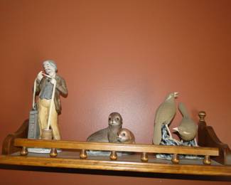 Beautiful decorative figures and display shelf too