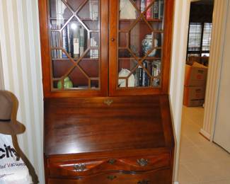 More than likely this is one of the best secretary's we have ever seen. Period original, with nicely curved drawers