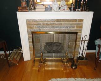 Yes the fireplace is faux, and it is for sale, along with all the brass pieces too