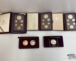 694 3 United States Mint Prestige Sets and 2 United States Mint Olympic Coin Sets
