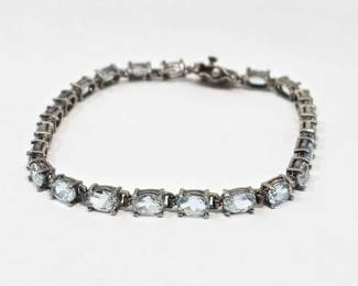 524 Sterling Silver with Topaz Bracelet. 10.3g
