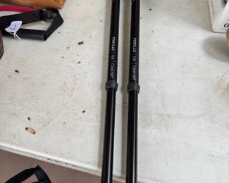 lots of pairs of walking poles