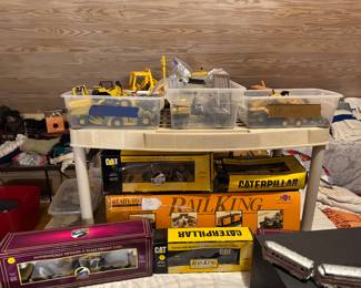 lots of trains and trucks and cars