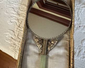 Vintage hand mirror with jadeite handle