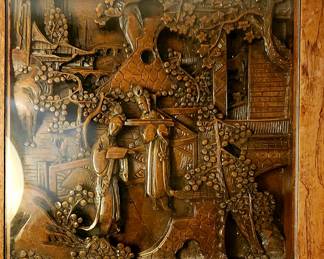 Intricately designed carved wood table 