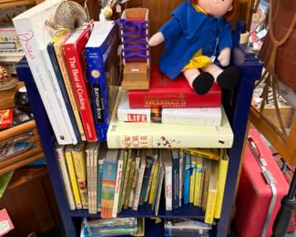vintage toys and books, suitcases