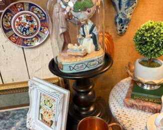 copper mug, cloche, vintage books, nativity scene