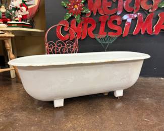 Antique enamel over metal baby bathtub with drain 