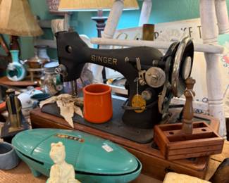singer sewing machine, figurines, chairs, lamps, framed art