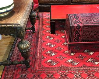 Large Persian rug with hole at end under sofa