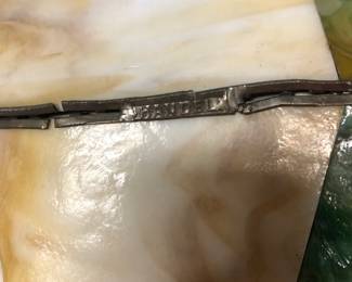 Handel tag inside shade