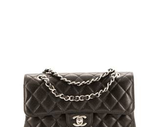 "This elegant Chanel Classic Double Flap Bag in small size is a timeless fashion statement. Crafted from luxurious quilted caviar leather, it features a striking black exterior with a classic red leather interior. The signature silver hardware adds a touch of sophistication. The bag is in very good condition, showcasing minor scuffs and wear on the exterior and interior, along with slight glitter and discoloration on the hardware. It comes with a protective dust bag, ensuring its longevity as a staple of your collection.

Victorins Auctions will coordinate all domestic and international shipping. Please allow approximately 10–15 business days for processing. Certain items may require additional handling time depending on their location, origin, or special packaging requirements. By registering for or placing a bid in a Victorins auction, you confirm that you have reviewed, understood, and agreed to our Shipping, Payment, and Auction Policies."
