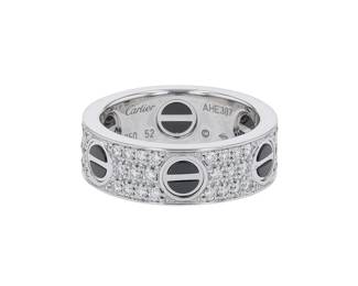 "This exquisite Cartier Love Pave ring combines luxury and elegance seamlessly. Crafted from 18k white gold, this modern masterpiece weighs 9.5 grams and features a stunning array of diamonds totaling 0.74 carats. With an intricate design highlighted by circular patterns and screw-like motifs, this piece is both a statement and a symbol of love. The ring's size is 52, and due to its sophisticated construction, resizing is not an option. This beautiful ring is a perfect gift for those who cherish luxury and timeless design.

Victorins Auctions will coordinate all domestic and international shipping. Please allow approximately 10–15 business days for processing. Certain items may require additional handling time depending on their location, origin, or special packaging requirements. By registering for or placing a bid in a Victorins auction, you confirm that you have reviewed, understood, and agreed to our Shipping, Payment, and Auction Policies."
