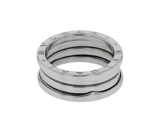 "This stunning Bulgari B.Zero 1 ring is a modern piece crafted from 18k white gold. Its elegant design features multiple layered bands, offering a distinctive and stylish look. Weighing 10.2 grams, with a band width of 0.8 cm and a thickness of 0.3 cm, this ring is a perfect size 59. Its unique construction prohibits resizing, making it a true statement piece for any collection. Ideal for both casual and formal occasions, this Bulgari ring is a must-have for admirers of fine jewelry.

Victorins Auctions will coordinate all domestic and international shipping. Please allow approximately 10–15 business days for processing. Certain items may require additional handling time depending on their location, origin, or special packaging requirements. By registering for or placing a bid in a Victorins auction, you confirm that you have reviewed, understood, and agreed to our Shipping, Payment, and Auction Policies."
