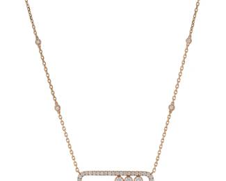 "This exquisite Messika Move necklace showcases stunning craftsmanship, designed for the modern connoisseur. Crafted from 18k rose gold, this necklace features a delicate chain that measures adjustable lengths from 36.5 to 44.5 cm, offering versatility in styling. The highlight is the elegant oval pendant, adorned with three beautiful diamonds, totaling 0.65 ct. With a width of 0.5 cm and a thickness of 0.4 cm, this piece weighs a delightful 8.1 grams, making it a lightweight yet striking accessory for any occasion.

Victorins Auctions will coordinate all domestic and international shipping. Please allow approximately 10–15 business days for processing. Certain items may require additional handling time depending on their location, origin, or special packaging requirements. By registering for or placing a bid in a Victorins auction, you confirm that you have reviewed, understood, and agreed to our Shipping, Payment, and Auction Policies."
