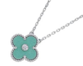 "This exquisite 2022 Holiday Edition pendant from Van Cleef & Arpels' Vintage Alhambra collection epitomizes elegance and craftsmanship. It features a serene blue celadon porcelain clover design, beautifully framed in luxurious 18K white gold. This limited-edition piece is not only a joy to wear but also a collector's treasure, showcasing the maison's dedication to timeless beauty. In very good pre-owned condition, it displays minimal signs of wear, making it perfect for both special occasions and everyday elegance.

Victorins Auctions will coordinate all domestic and international shipping. Please allow approximately 10–15 business days for processing. Certain items may require additional handling time depending on their location, origin, or special packaging requirements. By registering for or placing a bid in a Victorins auction, you confirm that you have reviewed, understood, and agreed to our Shipping, Payment, and Auction Policies."
