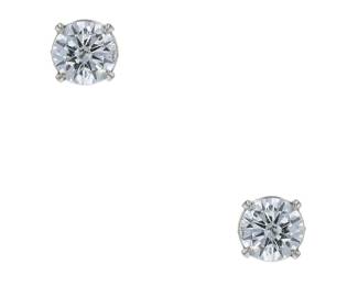 "These stunning earrings feature exquisite round, brilliant-cut diamonds elegantly set in a modern 18k white gold prong setting. Perfect for adding a touch of luxury to any outfit, they are both timeless and fashionable. With a total diamond weight of 2 carats and a sleek width of 0.6 cm, they are designed for pierced ears and weigh 2.2 grams. Ideal for special occasions or everyday elegance, these earrings are a must-have accessory for any jewelry lover.

Victorins Auctions will coordinate all domestic and international shipping. Please allow approximately 10–15 business days for processing. Certain items may require additional handling time depending on their location, origin, or special packaging requirements. By registering for or placing a bid in a Victorins auction, you confirm that you have reviewed, understood, and agreed to our Shipping, Payment, and Auction Policies."
