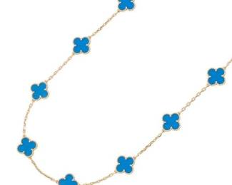 "This stunning Van Cleef & Arpels Vintage Alhambra necklace is a luxurious adornment that features ten enchanting Blue Agate motifs. Crafted in solid 18K yellow gold, the necklace showcases the Maison's iconic clover silhouette, each motif radiating a rich blue hue that complements the warm gleam of gold. The piece is in very good pre-owned condition and comes with its original presentation box. A perfect enhancement for any jewelry collection, it is versatile enough for both casual outings and formal events.

Victorins Auctions will coordinate all domestic and international shipping. Please allow approximately 10–15 business days for processing. Certain items may require additional handling time depending on their location, origin, or special packaging requirements. By registering for or placing a bid in a Victorins auction, you confirm that you have reviewed, understood, and agreed to our Shipping, Payment, and Auction Policies."
