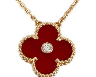 "This exquisite Van Cleef & Arpels 2011 Holiday Edition Vintage Alhambra necklace showcases a striking Red Carnelian motif, beautifully set in solid 18K rose gold. Released exclusively for the holiday season of 2011, it is a collectible piece that exemplifies luxury and elegance. The warm tones of rose gold create a stunning contrast with the vibrant red, making it a perfect accessory or gift. This necklace comes with its original presentation box and is in very good pre-owned condition.

Victorins Auctions will coordinate all domestic and international shipping. Please allow approximately 10–15 business days for processing. Certain items may require additional handling time depending on their location, origin, or special packaging requirements. By registering for or placing a bid in a Victorins auction, you confirm that you have reviewed, understood, and agreed to our Shipping, Payment, and Auction Policies."
