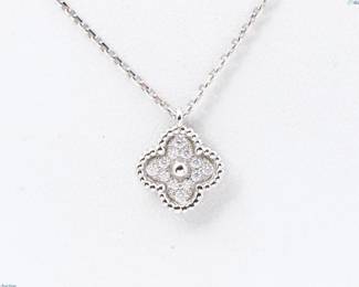 "This exquisite Van Cleef & Arpels Sweet Alhambra pendant necklace embodies elegance and charm. Crafted from luxurious 18K white gold, the necklace features a signature four-leaf clover motif adorned with brilliant-cut diamonds, offering a sparkle that enhances its refined design. The delicate chain complements the pendant perfectly, making it an ideal accessory for any occasion. Included with the necklace is the original Van Cleef & Arpels presentation box, adding to its desirability. This piece is not just jewelry; it is a statement of timeless beauty.

Victorins Auctions will coordinate all domestic and international shipping. Please allow approximately 10–15 business days for processing. Certain items may require additional handling time depending on their location, origin, or special packaging requirements. By registering for or placing a bid in a Victorins auction, you confirm that you have reviewed, understood, and agreed to our Shipping, Payment, and Auction Policies."
