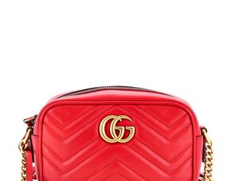 "Elevate your accessory game with this stunning Gucci GG Marmont Mini Shoulder Bag. Crafted from luxurious matelassé leather in vibrant red, this bag embodies sophistication and style. It features a striking chevron quilted design and is adorned with aged gold hardware for a touch of elegance. The functional design includes a chain strap with a drop length of 23 inches, making it perfect for any occasion. With an interior lined in neutral microfiber, this versatile piece effortlessly pairs with any outfit while bringing a pop of color.

Victorins Auctions will coordinate all domestic and international shipping. Please allow approximately 10–15 business days for processing. Certain items may require additional handling time depending on their location, origin, or special packaging requirements. By registering for or placing a bid in a Victorins auction, you confirm that you have reviewed, understood, and agreed to our Shipping, Payment, and Auction Policies."
