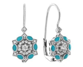 "These exquisite Art Deco Floral Drop Earrings feature a stunning design crafted in 14K white gold. Adorned with sparkling diamonds and turquoise blue enamel, they embody a perfect blend of vintage charm and modern elegance. Measuring 23 mm in length and 10 mm in width, these earrings have a total weight of approximately 3.25 grams, making them both lightweight and comfortable for everyday wear or special occasions. The intricate flower motif captures light beautifully, allowing for a radiant display of luxury and sophistication.

Victorins Auctions will coordinate all domestic and international shipping. Please allow approximately 10–15 business days for processing. Certain items may require additional handling time depending on their location, origin, or special packaging requirements. By registering for or placing a bid in a Victorins auction, you confirm that you have reviewed, understood, and agreed to our Shipping, Payment, and Auction Policies."
