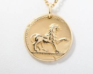 "This stunning Van Cleef & Arpels Zodiac Leo Lion Medallion Pendant Necklace is a true collector's treasure. Crafted from luxurious 18K yellow gold, this exquisite piece beautifully showcases the iconic Leo motif. The intricately detailed lion symbolizes strength, vitality, and leadership, reflecting the Maison's dedication to mythological themes. With its elegant design and substantial feel, this necklace captures the timeless sophistication characteristic of Van Cleef & Arpels. It includes the original presentation box, perfect for gifting or display.

Victorins Auctions will coordinate all domestic and international shipping. Please allow approximately 10–15 business days for processing. Certain items may require additional handling time depending on their location, origin, or special packaging requirements. By registering for or placing a bid in a Victorins auction, you confirm that you have reviewed, understood, and agreed to our Shipping, Payment, and Auction Policies."

