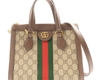 "This exquisite Gucci Ophidia Small Tote is crafted from high-quality PVC coated canvas, featuring a stylish brown color that is both elegant and versatile. It measures W: 24cm, H: 20cm, and D: 9.5cm, making it the perfect size for a day out or a casual evening. With a comfortable hand-turned shoulder strap and an adjustable shoulder strap, it offers two carrying options. The iconic Gucci logo and signature green-red stripe add a touch of luxury to this pre-owned bag, which is in good condition and ready to accompany you on your next adventure.

Victorins Auctions will coordinate all domestic and international shipping. Please allow approximately 10–15 business days for processing. Certain items may require additional handling time depending on their location, origin, or special packaging requirements. By registering for or placing a bid in a Victorins auction, you confirm that you have reviewed, understood, and agreed to our Shipping, Payment, and Auction Policies."
