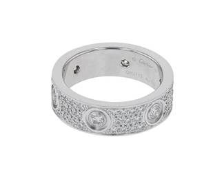 "Presented here is a stunning Cartier Love ring, showcasing modern elegance with its exquisite design. Crafted from 18k white gold, this piece features brilliant diamonds totaling 1.26 carats, highlighting its luxurious appeal. With a width of 0.7 cm and a thickness of 0.2 cm, this ring weighs 10.7 grams and is designed with a fixed ring size of 57. The modern artisan craftsmanship and the iconic Love motif make it a perfect accessory for special occasions or everyday wear.

Victorins Auctions will coordinate all domestic and international shipping. Please allow approximately 10–15 business days for processing. Certain items may require additional handling time depending on their location, origin, or special packaging requirements. By registering for or placing a bid in a Victorins auction, you confirm that you have reviewed, understood, and agreed to our Shipping, Payment, and Auction Policies."
