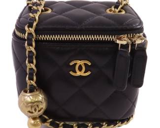 "This elegant Chanel Mini Vanity Case Shoulder Bag is crafted from luxurious black sheepskin leather, featuring a timeless quilted design that exudes sophistication. With a compact size of 10.5 cm x 9 cm x 7.5 cm (4.1 inch x 3.5 inch x 3.0 inch), it offers an ideal blend of style and practicality. The gold chain strap adds a chic touch, complemented by a secure zipper closure. This pre-owned bag is in good condition and includes a hologram sticker and a date code #30666338, making it a perfect addition for any fashion enthusiast.

Victorins Auctions will coordinate all domestic and international shipping. Please allow approximately 10–15 business days for processing. Certain items may require additional handling time depending on their location, origin, or special packaging requirements. By registering for or placing a bid in a Victorins auction, you confirm that you have reviewed, understood, and agreed to our Shipping, Payment, and Auction Policies."
