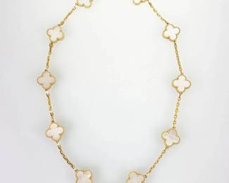"This exquisite Van Cleef & Arpels Vintage Alhambra necklace embodies elegance and sophistication. Crafted in solid 18K yellow gold, it features ten stunning White Mother of Pearl motifs that reflect soft iridescent tones. The necklace is perfect for both everyday wear and special occasions, making it a versatile addition to your jewelry collection. Accompanied by its original presentation box, it is in very good pre-owned condition, authenticated by a serial number check and verified by experts.

Victorins Auctions will coordinate all domestic and international shipping. Please allow approximately 10–15 business days for processing. Certain items may require additional handling time depending on their location, origin, or special packaging requirements. By registering for or placing a bid in a Victorins auction, you confirm that you have reviewed, understood, and agreed to our Shipping, Payment, and Auction Policies."
