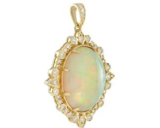 "This exquisite pendant features a stunning 9.46 ct. Ethiopian opal that displays an array of electric pastel hues, including charming shades of green, orange, and lavender. The opal is elegantly framed by a luxurious design adorned with 0.39 ct. of sparkling round diamonds. Perfect for those who appreciate antique style, this pendant measures 35 mm in length and 23 mm in width, weighing approximately 6.06 grams. A perfect addition to any jewelry collection, it captures both light and attention beautifully.

Victorins Auctions will coordinate all domestic and international shipping. Please allow approximately 10–15 business days for processing. Certain items may require additional handling time depending on their location, origin, or special packaging requirements. By registering for or placing a bid in a Victorins auction, you confirm that you have reviewed, understood, and agreed to our Shipping, Payment, and Auction Policies."
