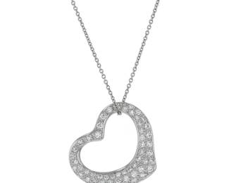 "This exquisite Tiffany & Co. Open Heart necklace is crafted from high-quality platinum and adorned with sparkling diamonds, making it a timeless piece that embodies elegance and love. The heart-shaped pendant features a stunning design with an open center and is surrounded by a total diamond weight of 1.11 carats. The necklace measures 39 cm in length and 2.1 cm in width, making it a perfect fit for any occasion. Weighing 9.7 grams, this lightweight piece ensures comfort while adding a luxurious touch to your outfit. A must-have for any fine jewelry collection.

Victorins Auctions will coordinate all domestic and international shipping. Please allow approximately 10–15 business days for processing. Certain items may require additional handling time depending on their location, origin, or special packaging requirements. By registering for or placing a bid in a Victorins auction, you confirm that you have reviewed, understood, and agreed to our Shipping, Payment, and Auction Policies."
